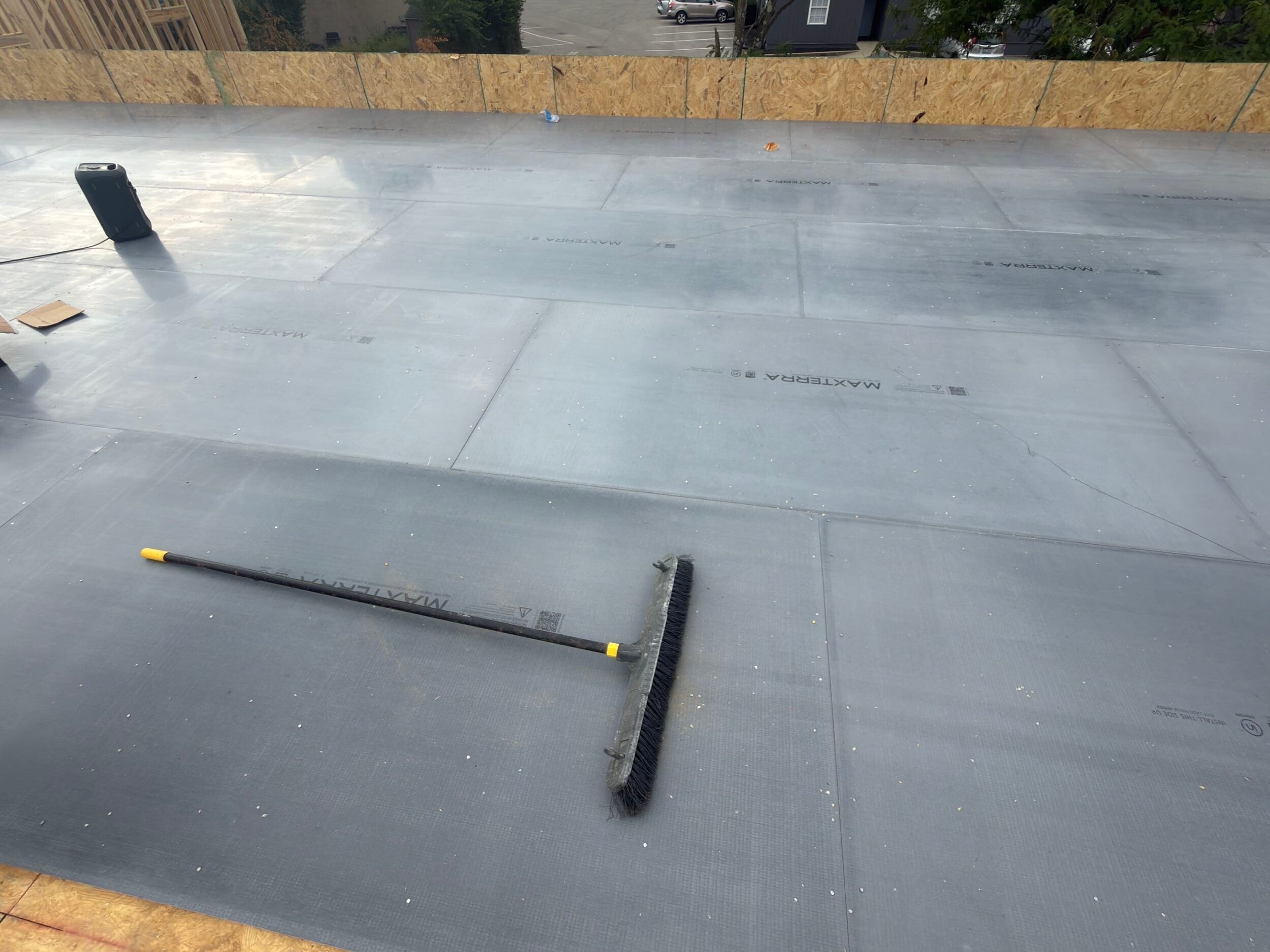 Installed MAXTERRA underlayment panels at The Railyard, with panel joints and MAXTERRA markings visible across the floor.